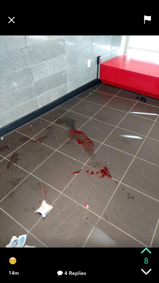 The suspect's blood left on the ground after the arrest. Photo C/O Stephen Hanna